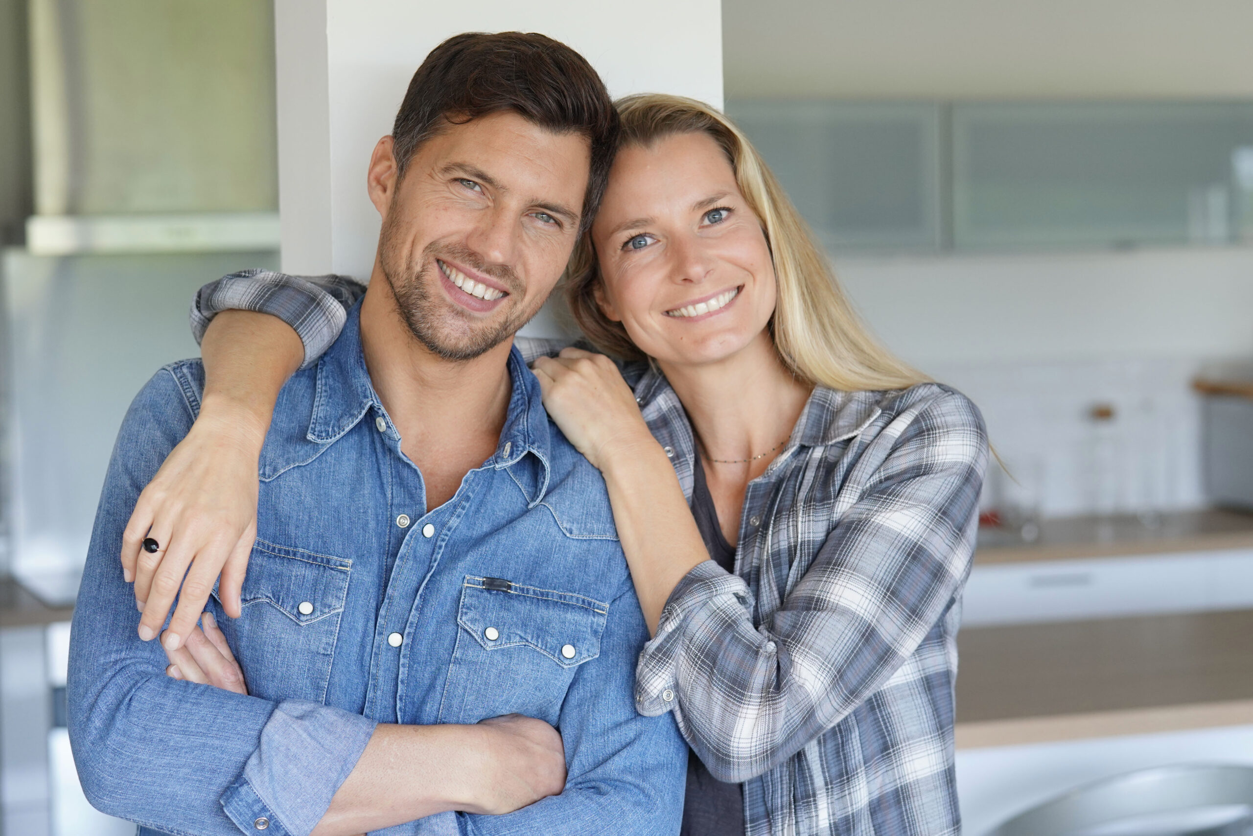 Portrait,Of,Cheerful,Middle-aged,Couple,At,Home Family Dentistry